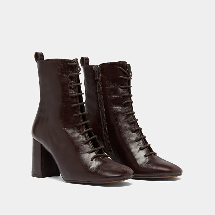 Heeled and lace-up ankle boots in chocolate distressed leather