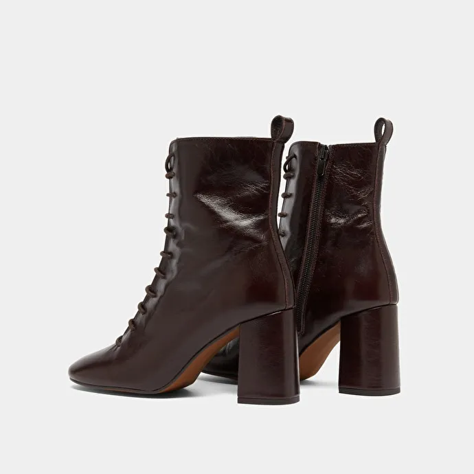 Heeled and lace-up ankle boots in chocolate distressed leather